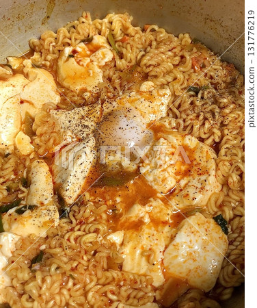 Shin Ramyun,close up of Ramyeon or Ramyun is a Korean-style soup noodle dish with a spicy flavor. Ramyeon or Korean instant noodles with egg - Korean food style Shin Ramyun,close up of Ramyeon or Ramyun is a Korean-style soup noodle dish with a spicy flavor. Ramyeon or Korean instant noodles with egg - Korean food style 131776219