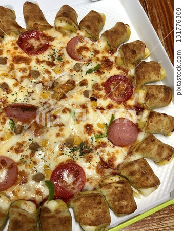 A delicious pizza with a golden crust, melted cheese, and savory toppings. Perfect for food-related designs, menus, or Italian-themed projects, capturing the essence of a classic comfort dish. A delicious pizza with a golden crust, melted cheese, and savory toppings. Perfect for food-related designs, menus, or Italian-themed projects, capturing the essence of a classic comfort dish. 131776309