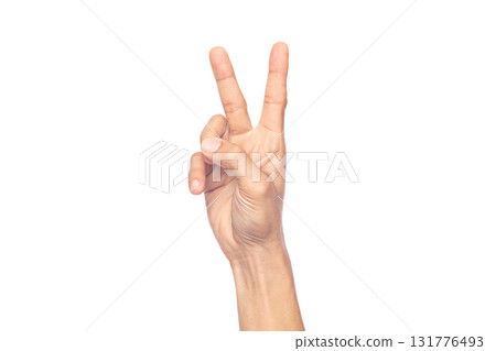 A man's hand holds up two fingers in a V shape to symbolize victory, isolated on white background A man's hand holds up two fingers in a V shape to symbolize victory, isolated on white background 131776493