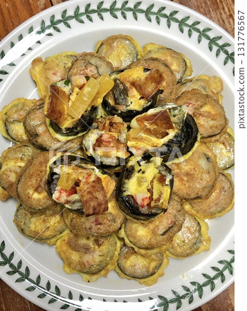 Crispy kimbap jeon made by pan-frying seaweed rice rolls in a savory egg batter. A delightful twist on classic kimbap, combining crunch and flavor in every satisfying bite. Crispy kimbap jeon made by pan-frying seaweed rice rolls in a savory egg batter. A delightful twist on classic kimbap, combining crunch and flavor in every satisfying bite. 131776567