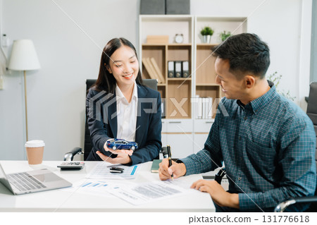 Capturing a cheerful business consultation scene with smiling professionals, perfect for illustrating corporate success, teamwork, 131776618