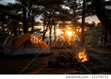 Evening warmth at a peaceful campsite surrounded by trees 131776715