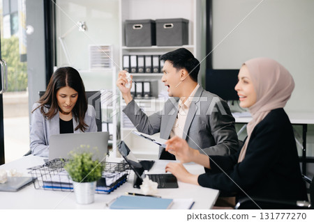 Furious businesspeople arguing strongly after making a mistake at work in office 131777270