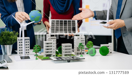 business team people planning and discussing on recycle reduce reuse policy symbol in office meeting room. Green business company and Solar Energy Environment city 131777589