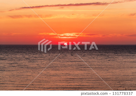 Beautiful red and orange sunrise over the sea. 131778337