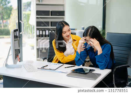 Furious two Asian businesspeople arguing strongly after making a mistake 131778551