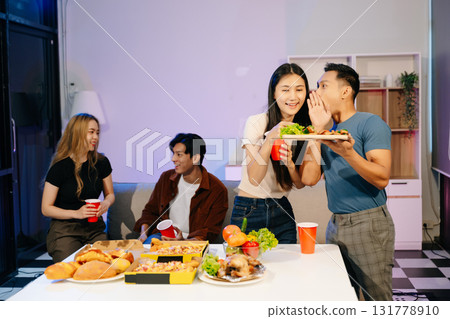 Group of Young Asian friend having, enjoy evening party together at home. 131778910