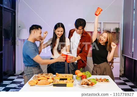 Celebrate friendship with delicious food, drinks, and cheerful moments indoors perfect 131778927