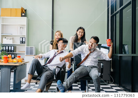 Lively office party with coworkers celebrating, enjoying pizza and drinks, and fostering team spirit 131779363
