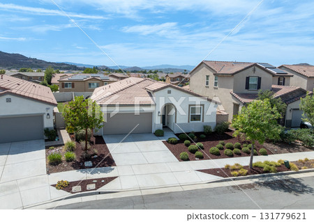 Aerial view of a sprawling neighborhood of family homes in Menifee, California, USA. 131779621