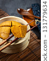 A stylish food gallery image featuring the traditional Hong Kong dim sum dessert steamed sponge cake 131779634