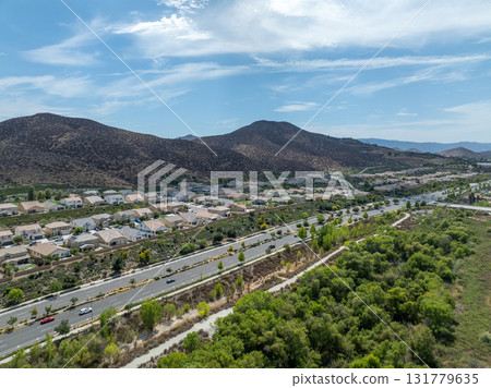 Aerial view of a sprawling neighborhood of family homes in Menifee, California, USA. 131779635