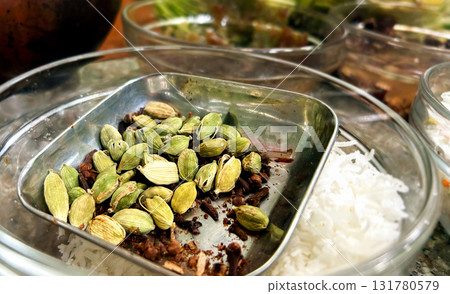 Display of Cardamom and cloves at the paan shop 131780579
