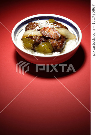 Sweet and sour pork bowl with black vinegar 131780967