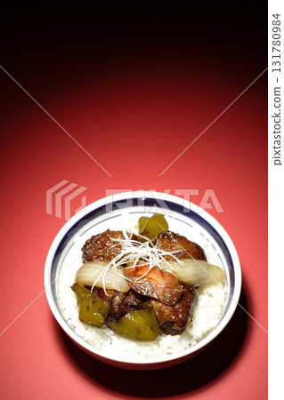 Sweet and sour pork bowl with black vinegar 131780984
