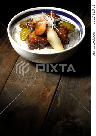 Sweet and sour pork bowl with black vinegar Sweet and sour pork bowl with black vinegar 131781011