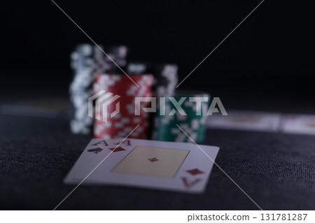 the poker game in casino chips cards and the poker table 131781287