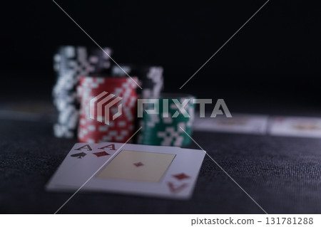 the poker game in casino chips cards and the poker table 131781288