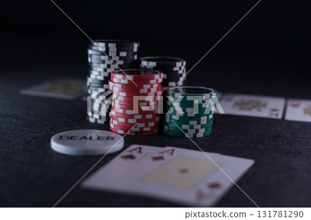 the poker game in casino chips cards and the poker table 131781290