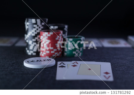 the poker game in casino chips cards and the poker table the poker game in casino chips cards and the poker table 131781292