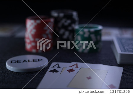 the poker game in casino chips cards and the poker table 131781296