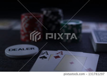 the poker game in casino chips cards and the poker table 131781297