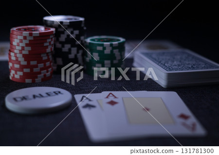 the poker game in casino chips cards and the poker table 131781300