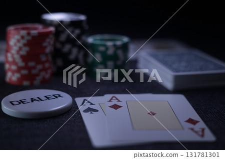 the poker game in casino chips cards and the poker table 131781301