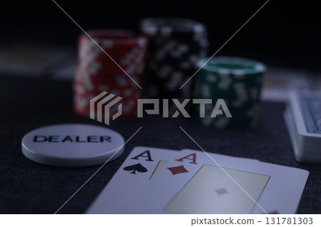 the poker game in casino chips cards and the poker table the poker game in casino chips cards and the poker table 131781303