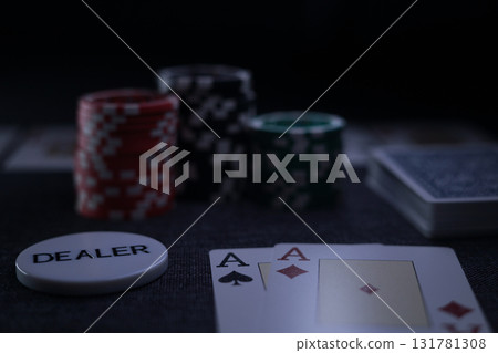 the poker game in casino chips cards and the poker table 131781308