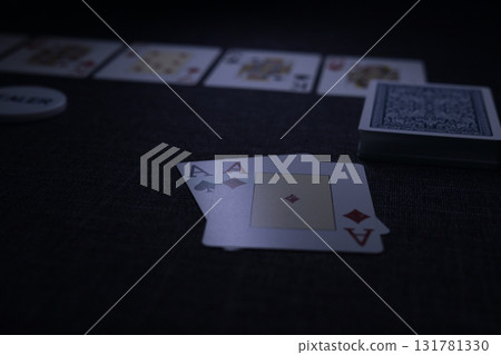 the poker game in casino chips cards and the poker table 131781330