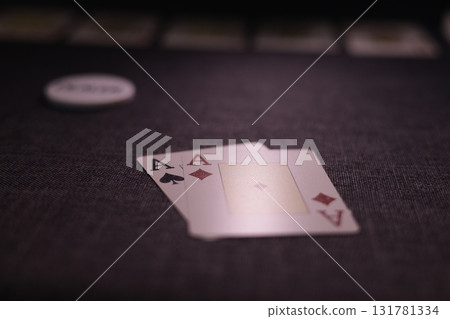 the poker game in casino chips cards and the poker table 131781334