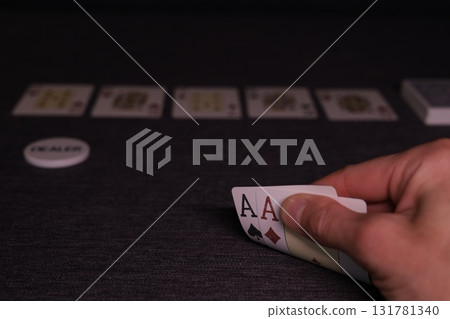 the poker game in casino chips cards and the poker table 131781340