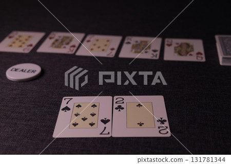 the poker game in casino chips cards and the poker table 131781344