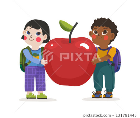 Two school children boy and girl smile and hold a large red apple on a white background 131781443