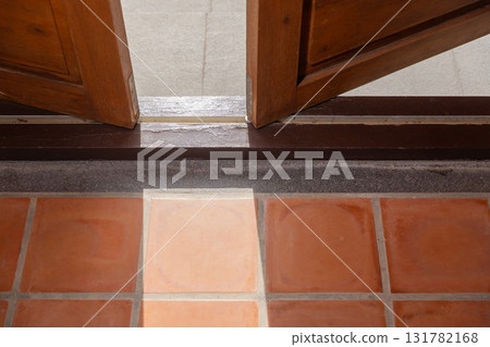 Bottom running bifold system is installed on the floor. 131782168