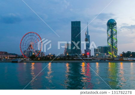 Batumi, Adjara, Georgia. View from the sea on illuminated resort town at evening Batumi, Adjara, Georgia. View from the sea on illuminated resort town at evening 131782278