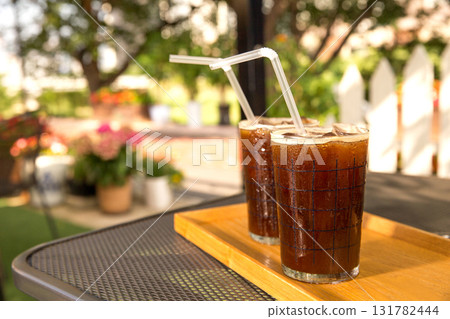 Iced coffee ordered at a cafe Iced coffee ordered at a cafe 131782444