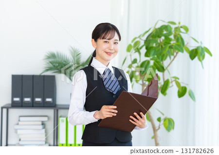 Business woman at the reception Business woman at the reception 131782626