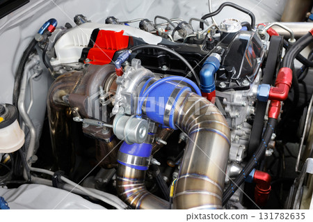 Turbo charger and waste gate on race car engine Turbo charger and waste gate on race car engine 131782635