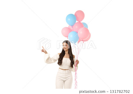 Woman in white outfit joyfully holding balloons, isolated on white, PNG Woman in white outfit joyfully holding balloons, isolated on white, PNG 131782702