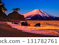 A composite of the predawn scenery of Urakatsurahama in Tosa and Mount Fuji dyed red 131782761
