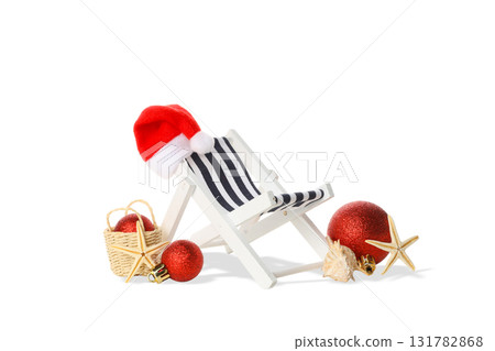 Christmas-decorated beach chair with a hat, on white, PNG 131782868