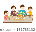 A family of four eating hotpot with a smile 131783132