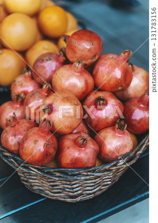Fresh Pomegranates in Basket at Street Market 131783156