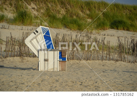 sylt blue and white stripes sunbed on the beach 131785162