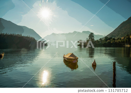 nICE VIEW ON lAKE Como: boats in water (moored) and island Comacino 131785712