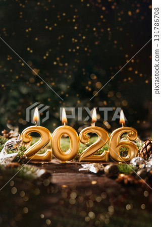 Holiday background Happy New Year 2026. Numbers of year 2026 made by gold burning candles on bokeh festive sparkling background. celebrating New Year holiday, close-up. Space for text 131786708