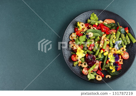 Salad with prawns and vegetables. Salad with prawns and vegetables. 131787219