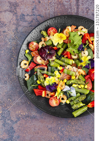 Salad with prawns and vegetables. 131787220